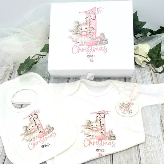 First Christmas gift set with white bib, babygro and ceramic decoration all printed with pink design and ballerina bunny and child's name. 