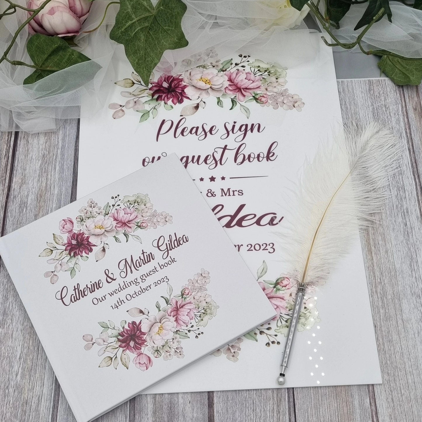 Personalised wedding guest book with pink and burgundy floral details with couples name and wedding date. Matching A3 Acrylic Sign