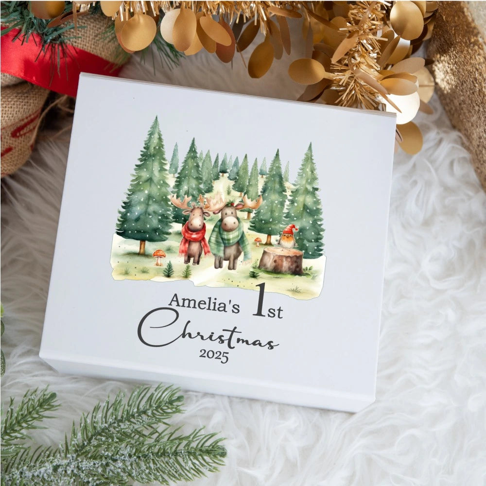 Gift box with Woodland Christmas design and text 'Amelia's 1st Christmas 2025' on a festive background.