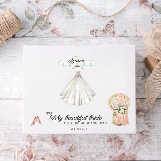 Beautiful white bride to be gift box with design of wedding gown on a hanger with bride's name on the hanger. Personalised with name, and date.