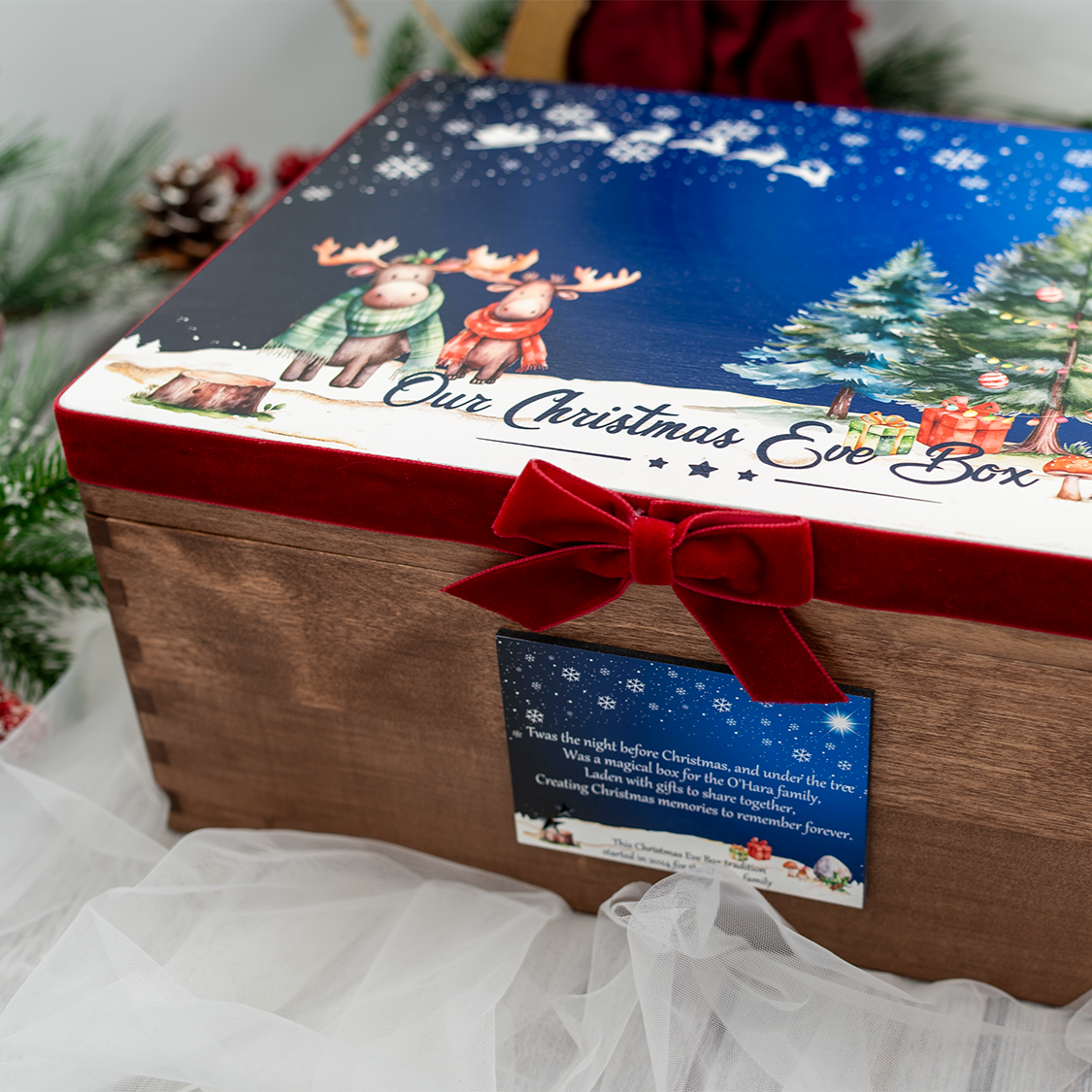 Festive personalised Christmas Eve Box with illustrated Christmas tree design, velvet ribbon, and keepsake message – ideal family gift.