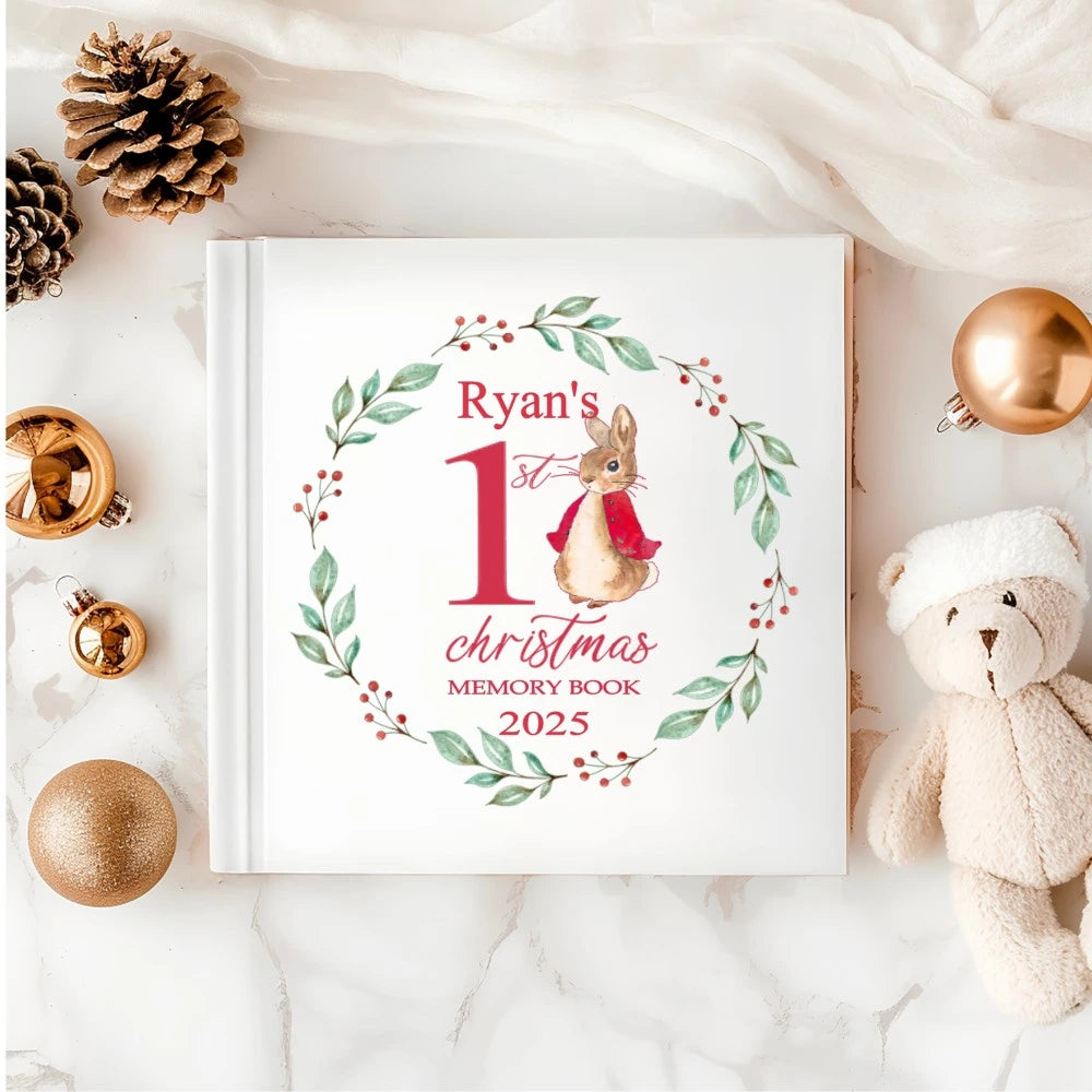 ersonalised Baby’s First Christmas Memory Book with bunny and holly wreath design – white hardback keepsake, printed in Ireland