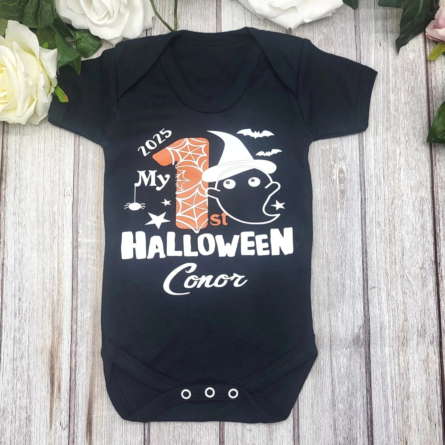 Close-up of personalised Halloween baby vest, Meath-based Irish studio
