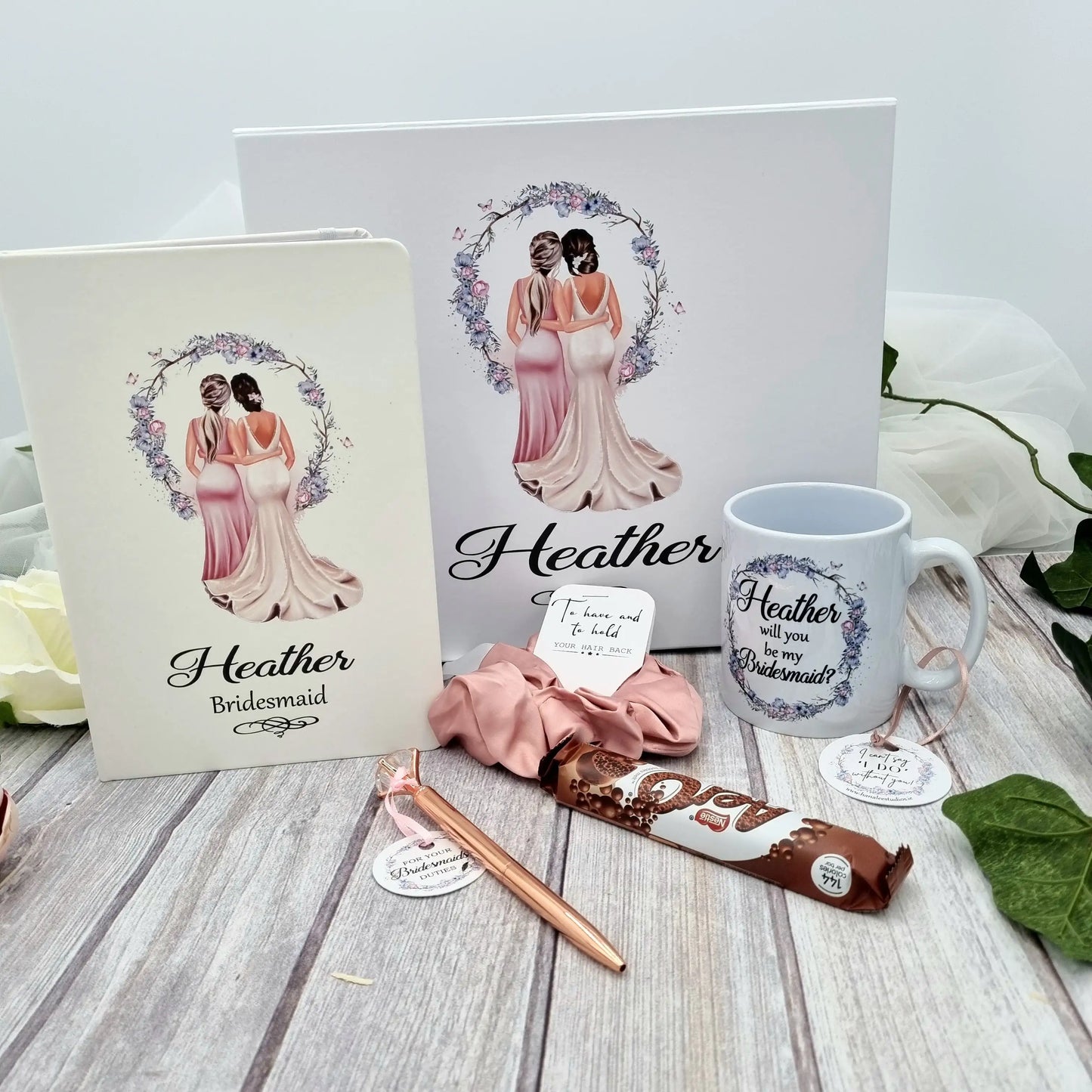 Bridesmaid proposal gift set with box, notebook, mug, pen, scrunchie and chocolate.