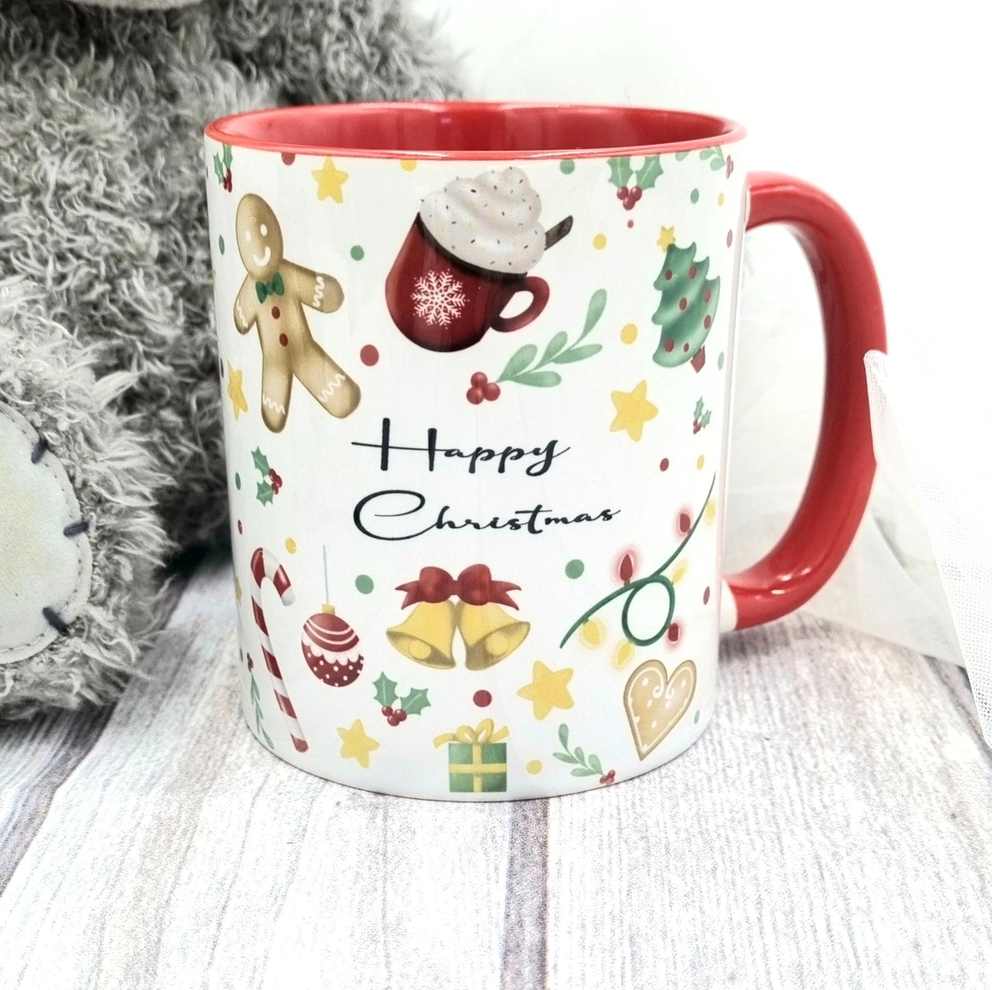 Custom hot chocolate mug with name Claire, Christmas illustrations and red handle