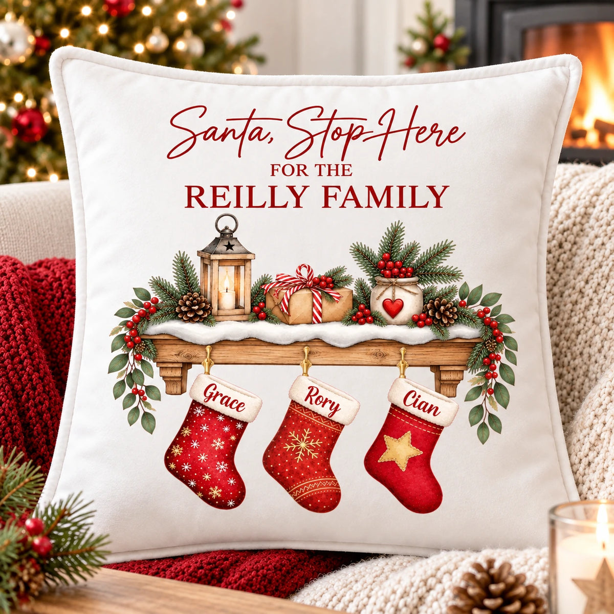 Personalised white velvet family Christmas cushion with Reilly family name and children’s names on festive stockings