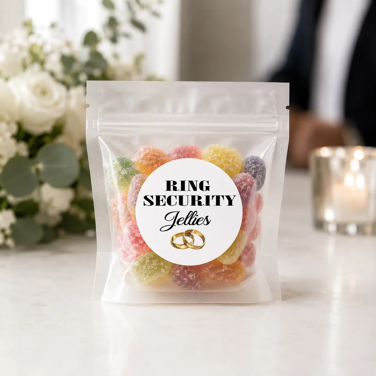 Ring security jellies presented in a gift pouch as part of a personalised page boy wedding gift set
