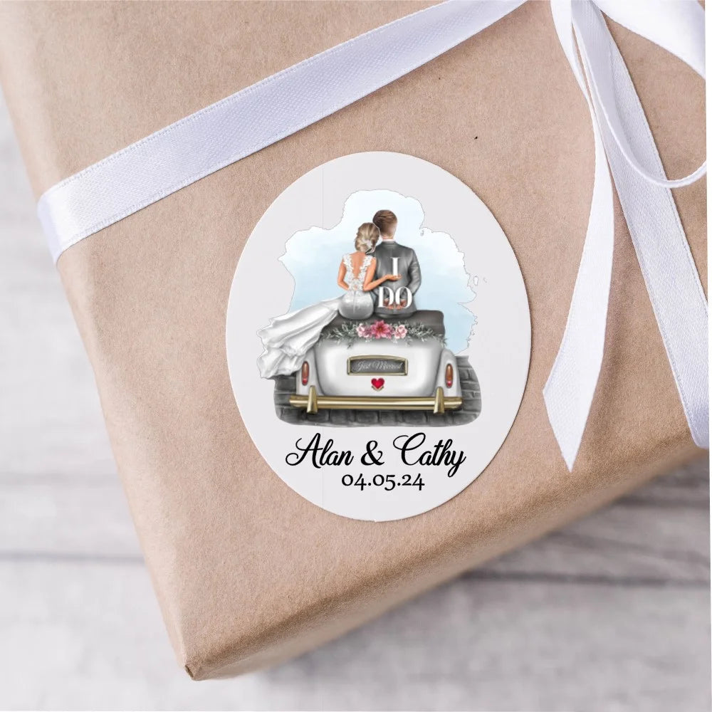 Customised wedding stickers with design of bride and groom sitting on a car with couples name and date.