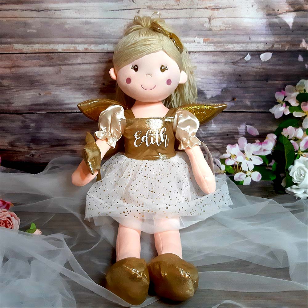HanaLee's personalised fairy rag dolls are larger than you think. Measuring 60cm with a beaitufl pink, silver or gold dress with childs name. All dolls have blonde hair.