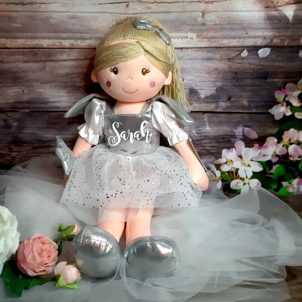 HanaLee's personalised fairy rag dolls are larger than you think. Measuring 60cm with a beaitufl pink, silver or gold dress with childs name. All dolls have blonde hair.