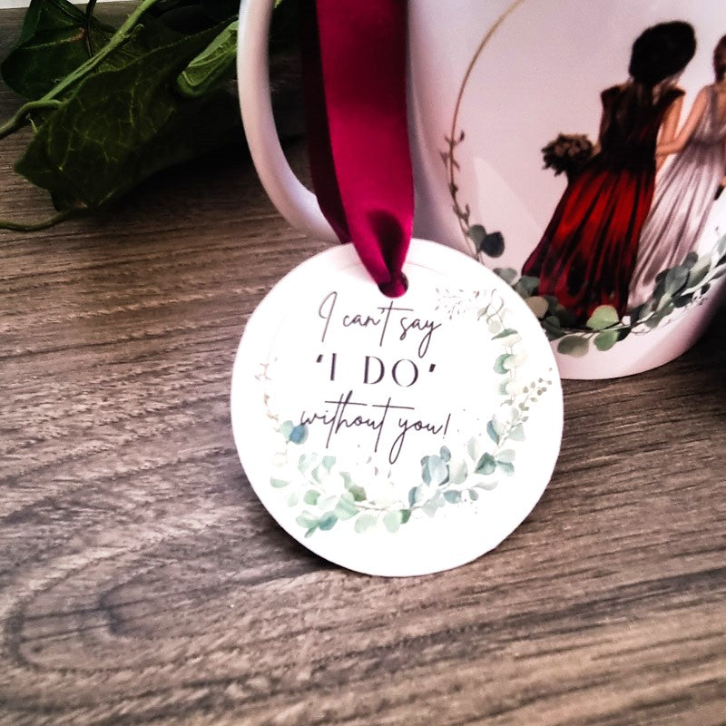 HanaLee's personalised bridesmaid or maif of honour mug with image of bride and bridesmaid. These are personalised with the name and hair colour.