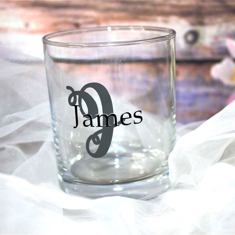 Wedding whiskey tumblers for groom with large charcoal colour initial and name in black