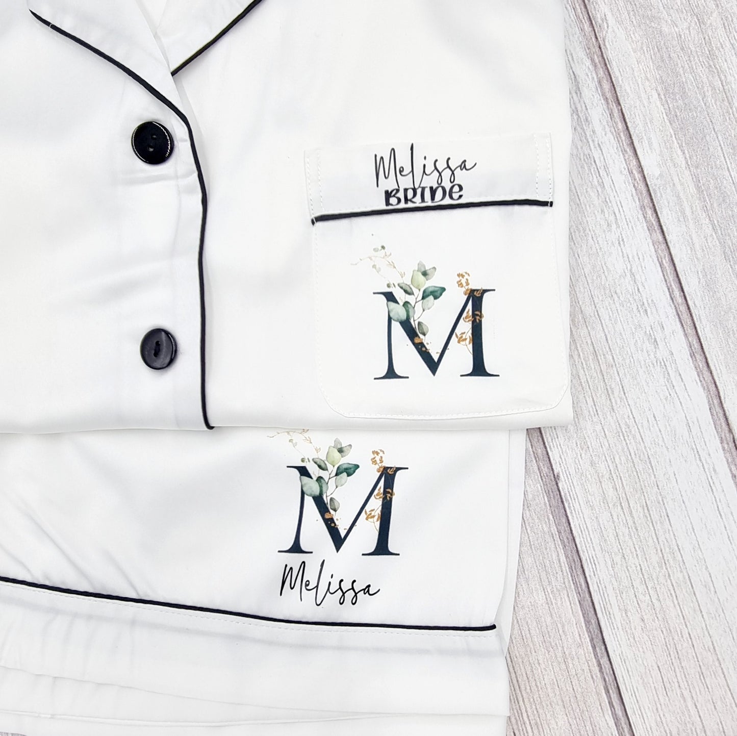White long sleeve and long bottoms pyjamas with beautiful initial design on pocket with name and title from HanaLee Studios