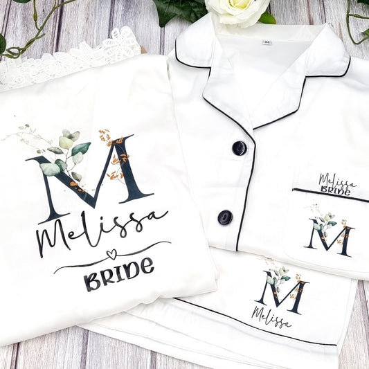Stunning white robe with lace along the bottom and sleeves. Personalised with initial, name and title. Perfect for bride, bridesmaids, mother of the bride or groom