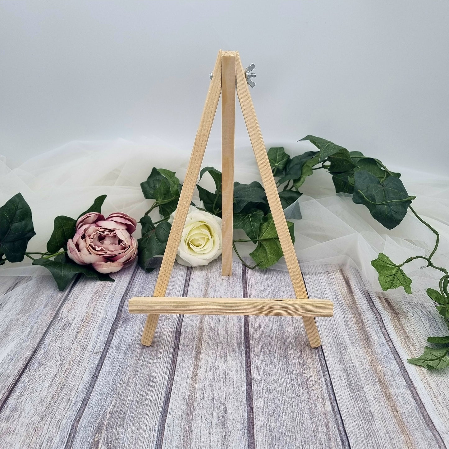 Wooden easel that comes with all of HanaLee's acrylic guest book stands