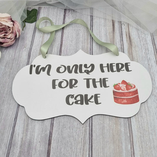 I'm only here for the cake sign
