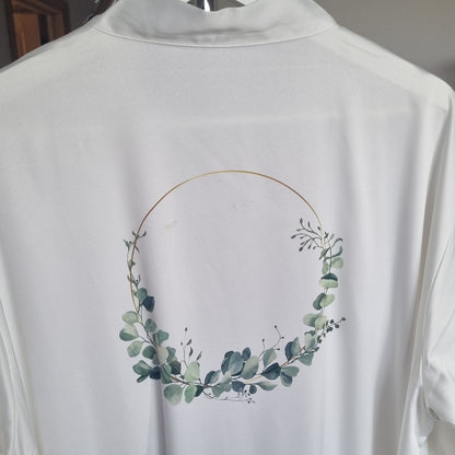 White robe printed with Wreath design with marks