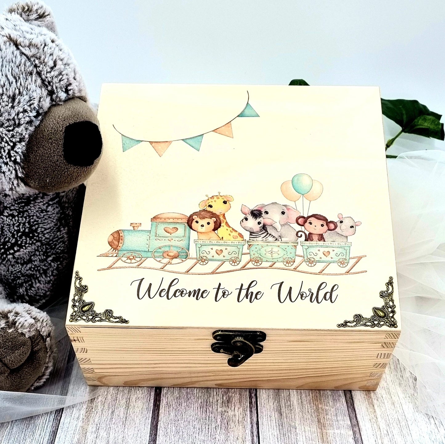 Animal Train personalised wooden baby box with design of blue train with baby animals. 