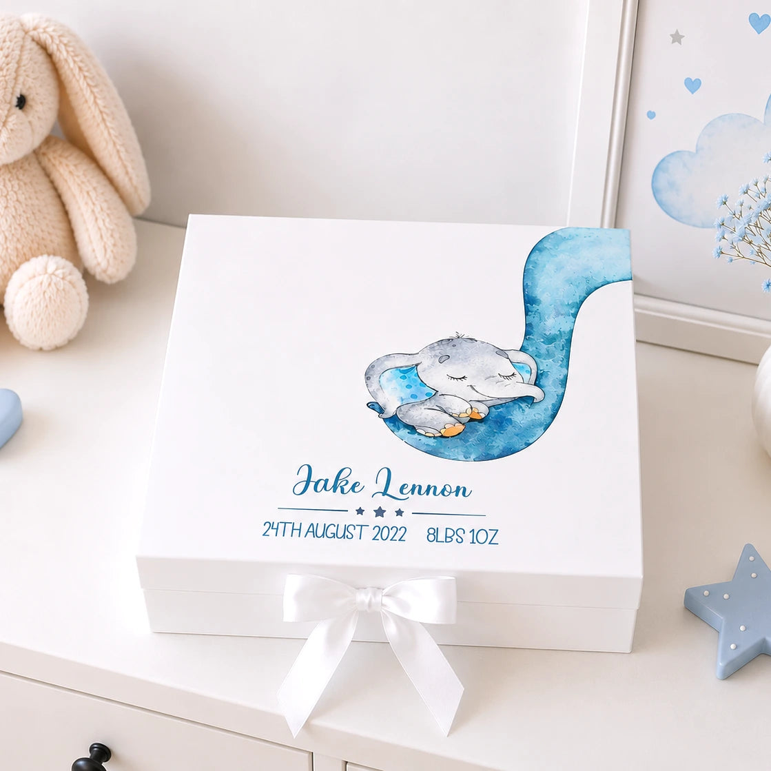 White keepsake box with blue elephant design and personalised with baby details. 