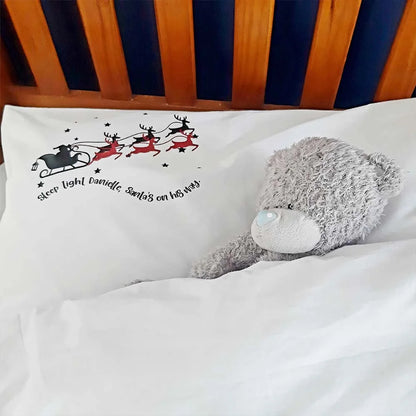 White Christmas eve pillowcase with black silhouette of Santa Sleigh and red glitter with personalised poem