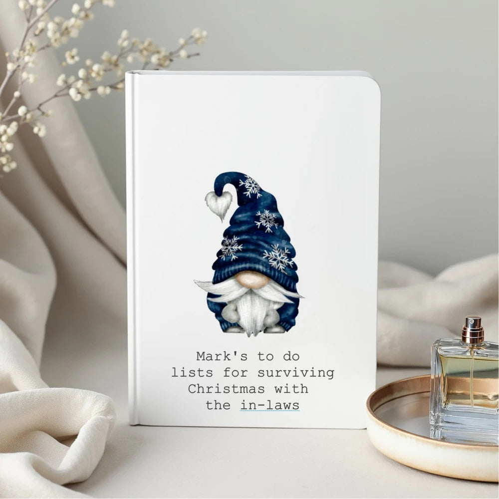 Personalised Christmas notebook with blue gnome design, custom name and text, printed in Ireland.