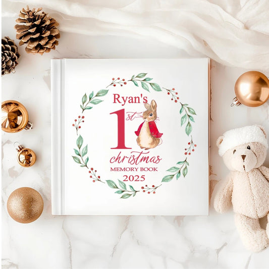 ersonalised Baby’s First Christmas Memory Book with bunny and holly wreath design – white hardback keepsake, printed in Ireland