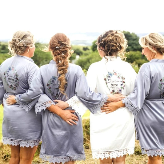 Dusty blue bridesmaids robes and white bridal robe persoanlised with name, title and beautiful butterfly wreath design