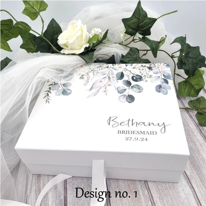 Beautiful white gift box with eucalyptus vine design and personalised with name, title and date. 