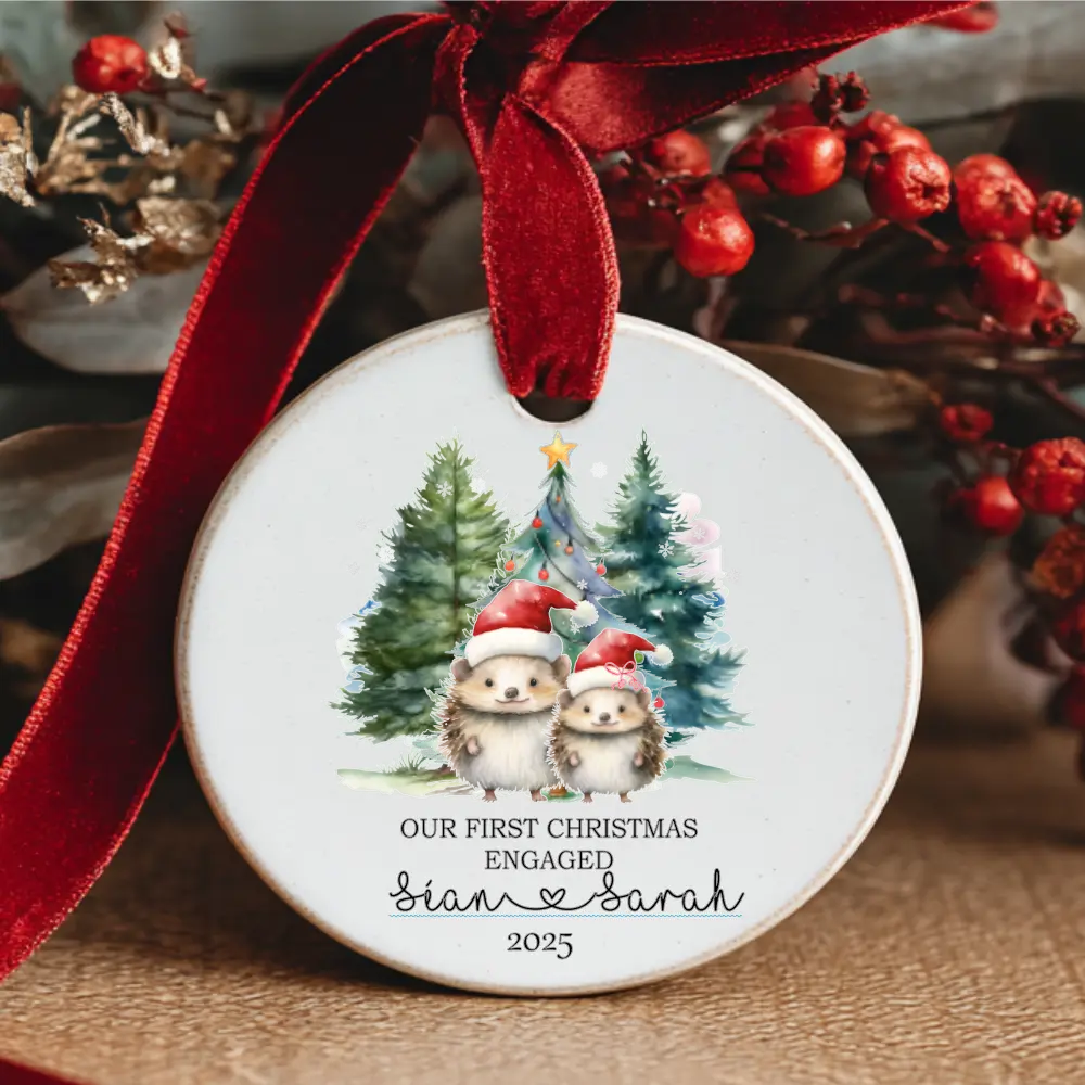 Personalised ‘Our First Christmas Engaged’ ceramic ornament with hedgehog couple and Christmas trees – custom names – HanaLee Studios Ireland
