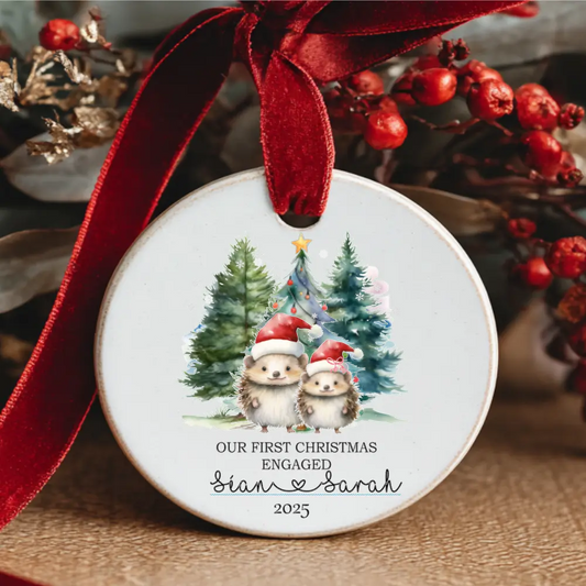 Personalised ‘Our First Christmas Engaged’ ceramic ornament with hedgehog couple and Christmas trees – custom names – HanaLee Studios Ireland