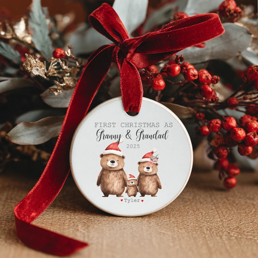 Personalised ceramic Christmas bauble with festive bear family design and text “First Christmas as Granny & Grandad” – handmade Irish gift with optional gift box.