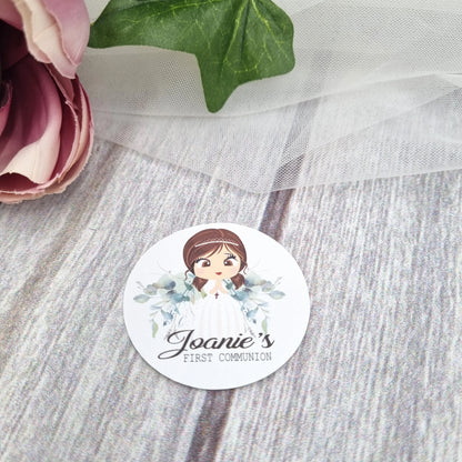 Detailed view of individual First Communion stickers including floral icons, name labels and date elements, Irish personalised