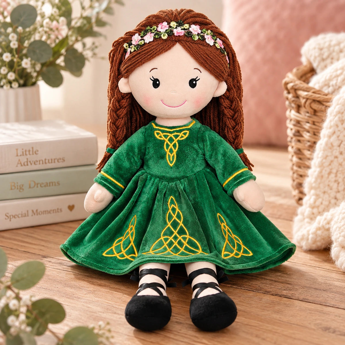 40cm Irish dancing plush doll wearing a green velour dress with gold Celtic embroidery, brown plaited hair and floral headband