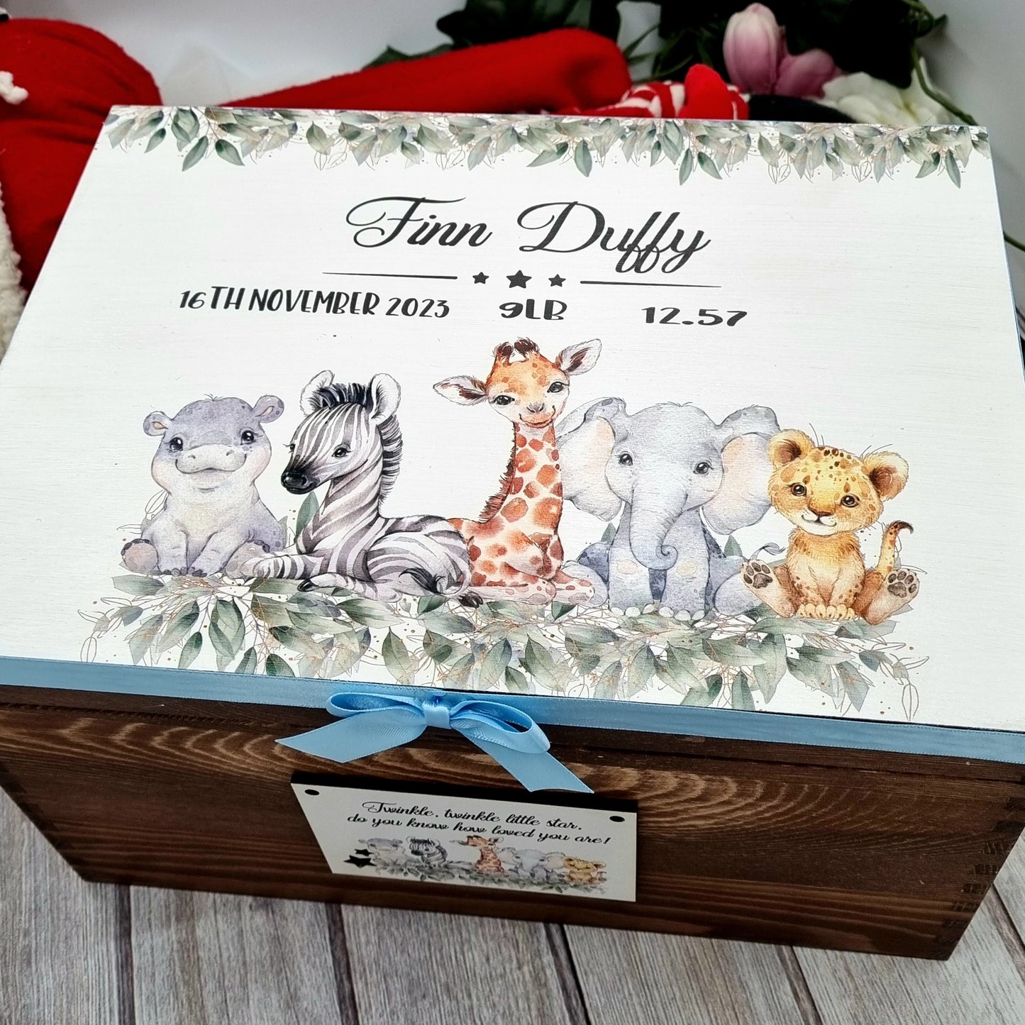 Large personalised birchwood baby memory box with full-colour jungle animal print, baby’s birth details, and decorative ribbon and handmade bow