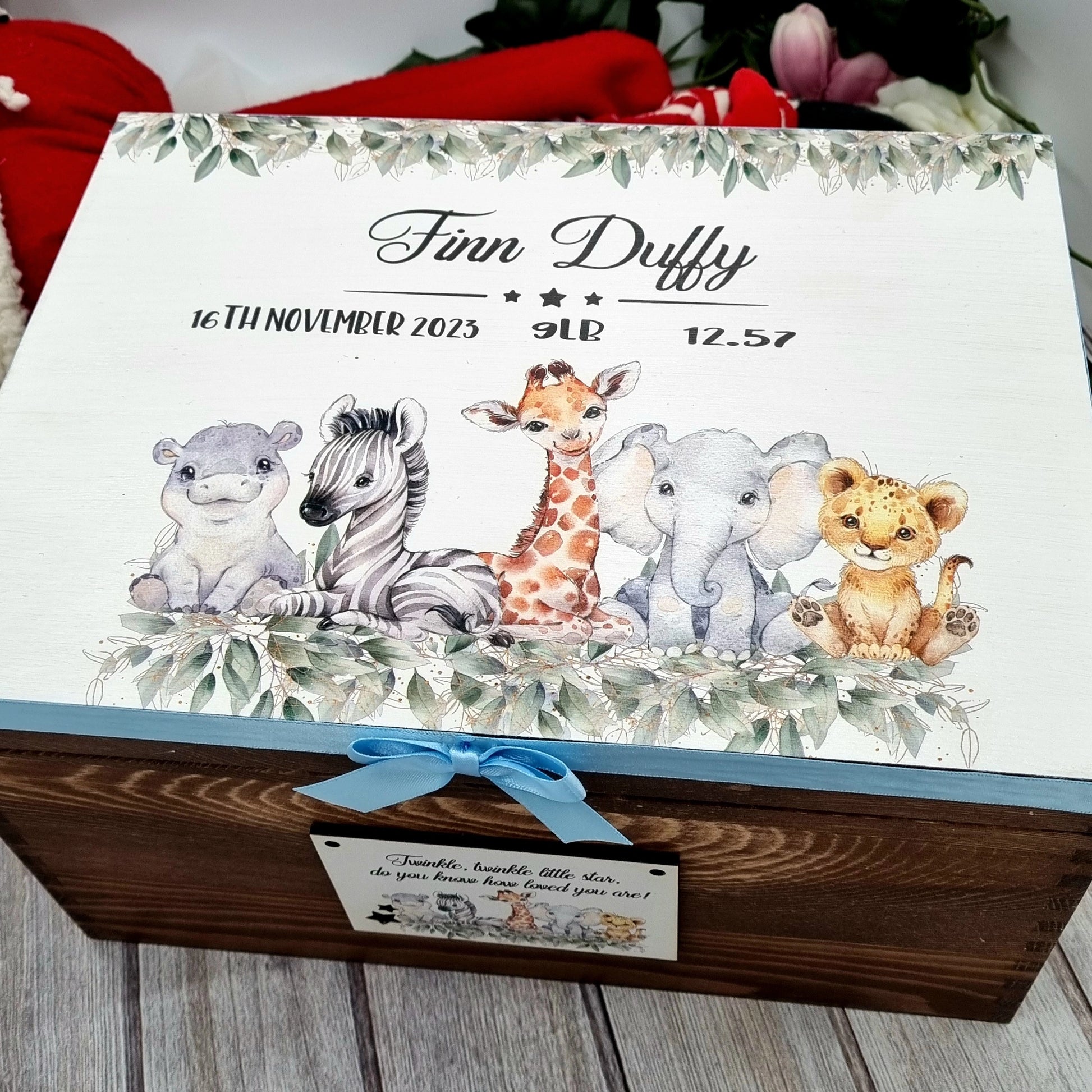 Large personalised birchwood baby memory box with full-colour jungle animal print, baby’s birth details, and decorative ribbon and handmade bow