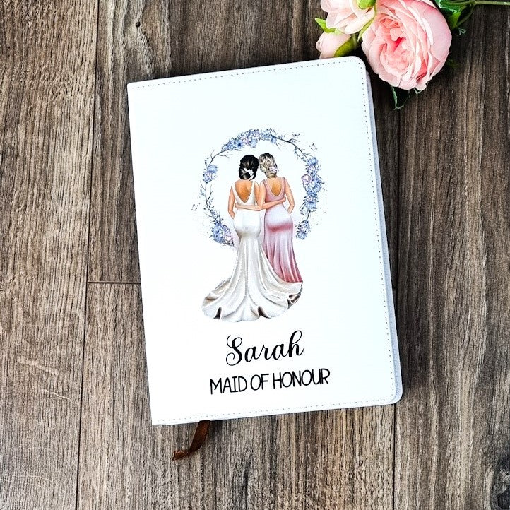 White A5 notebook with bride and bridesmaid design and personalised with name and title 