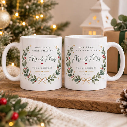 Set of two personalised First Christmas as Mr and Mrs mugs with surname and 2026 festive design, a Christmas gift for newlyweds.