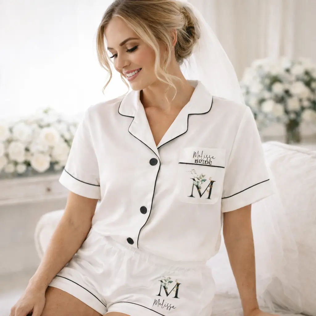 Bride wearing personalised white short pyjama set with custom name print, elegant wedding morning bridal prep outfit Ireland