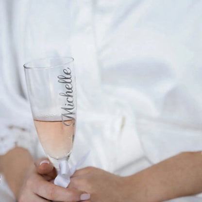 Personalised bridesmaid champagne flute with name and satin ribbon