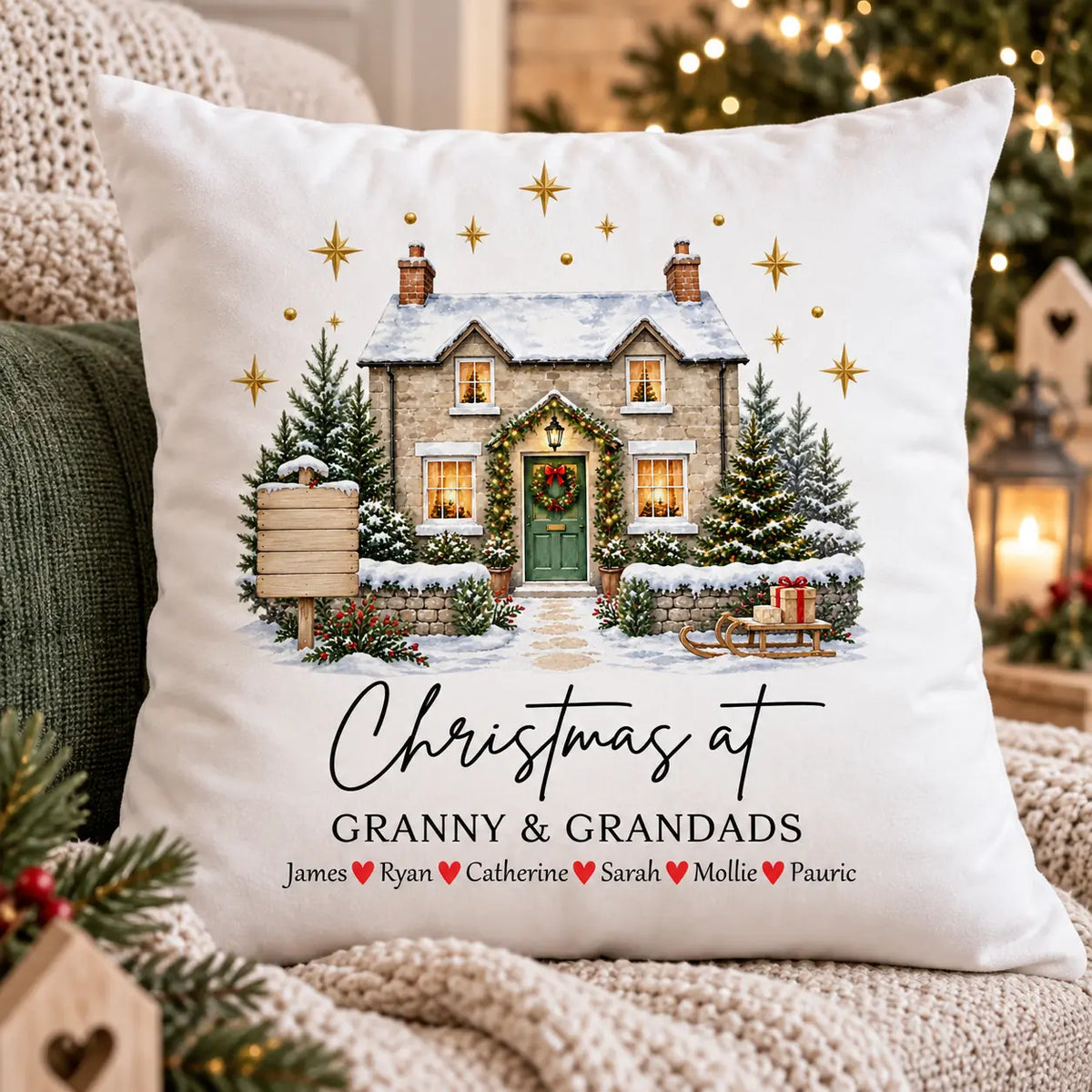 Personalised white velvet Christmas cushion for Granny and Grandad featuring grandchildren’s names and festive house design
