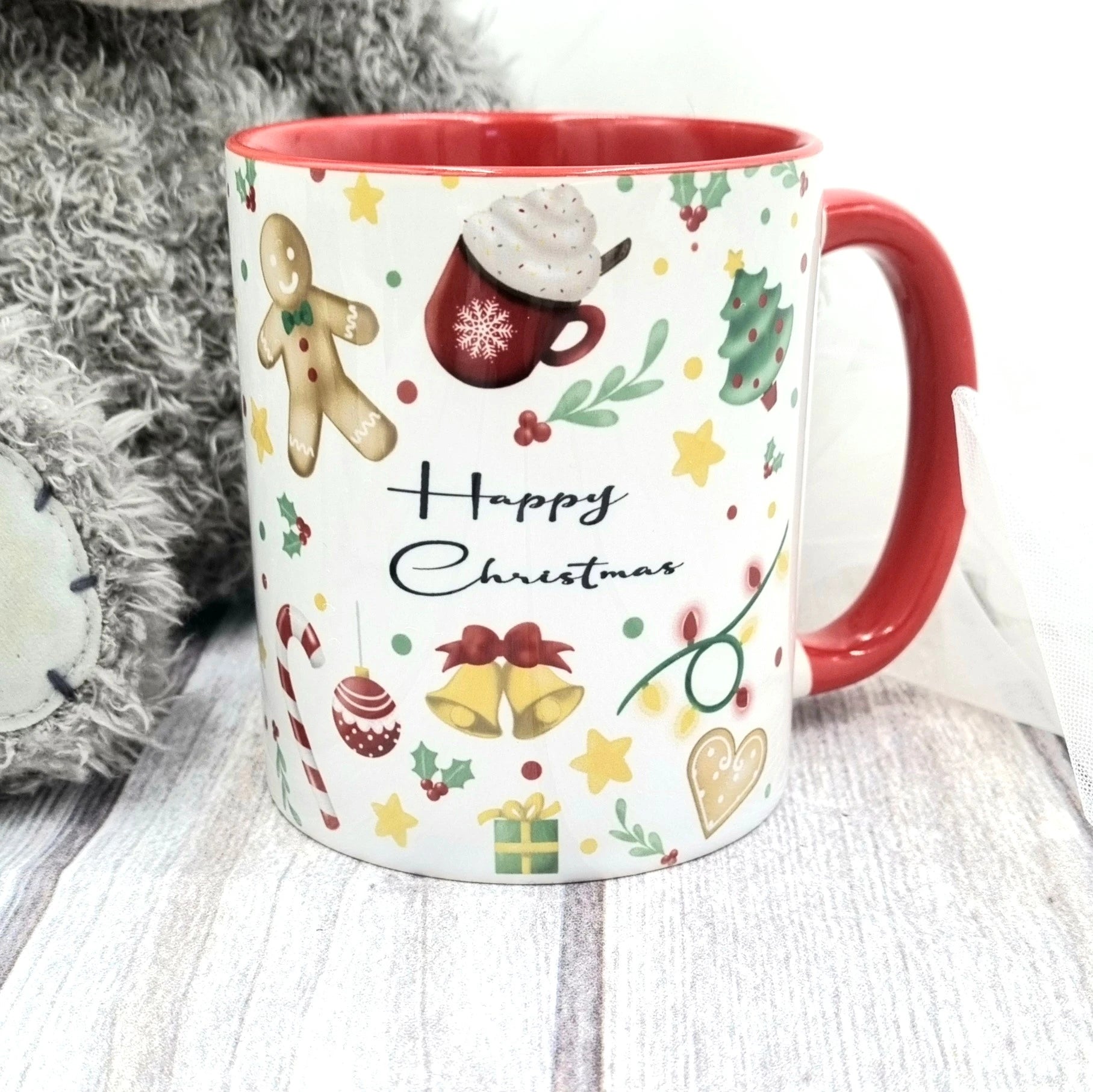Custom hot chocolate mug with name Claire, Christmas illustrations and red handle