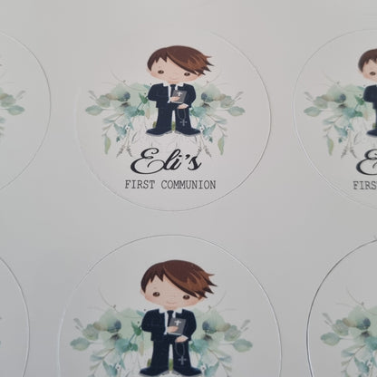 Photo showing scale of personalised First Communion sticker sheets held in hand, custom name and date printed stickers