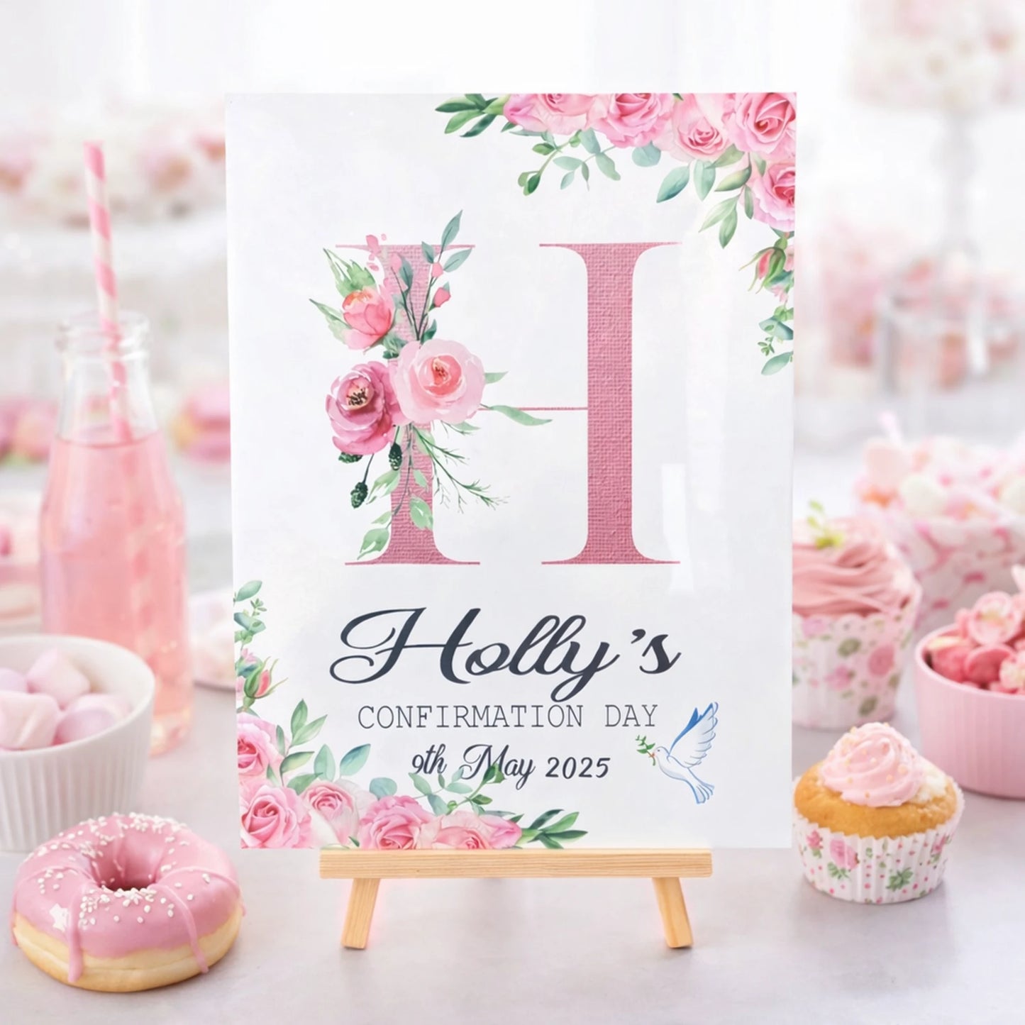 Personalised A3 confirmation welcome sign with floral initial and dove design, displayed on a wooden easel, Irish made by HanaLee Studios