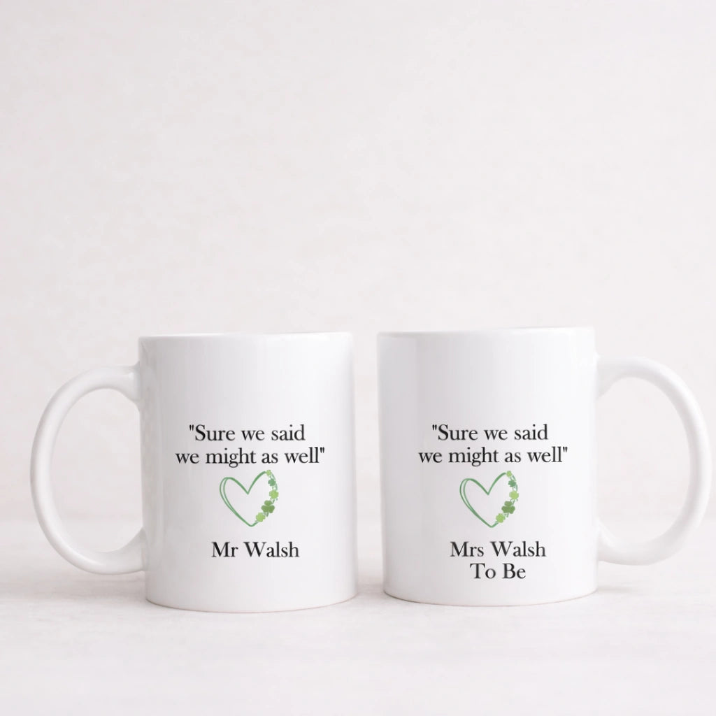 Personalised engaged mug set featuring Irish phrase “Sure we said we might as well” with Mr and Mrs To Be names, printed in Ireland