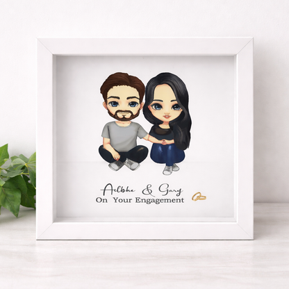 Personalised engagement frame featuring a custom illustrated couple in a white box frame, a unique engagement gift idea for couples, Irish made
