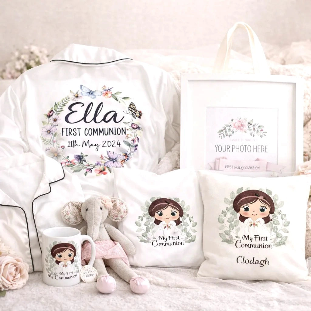 Personalised First Communion gift set including embroidered white pyjamas with name and date, matching cushion, mug, keepsake photo frame and soft toy, beautifully styled in soft pastel tones – Irish made communion keepsake bundle.