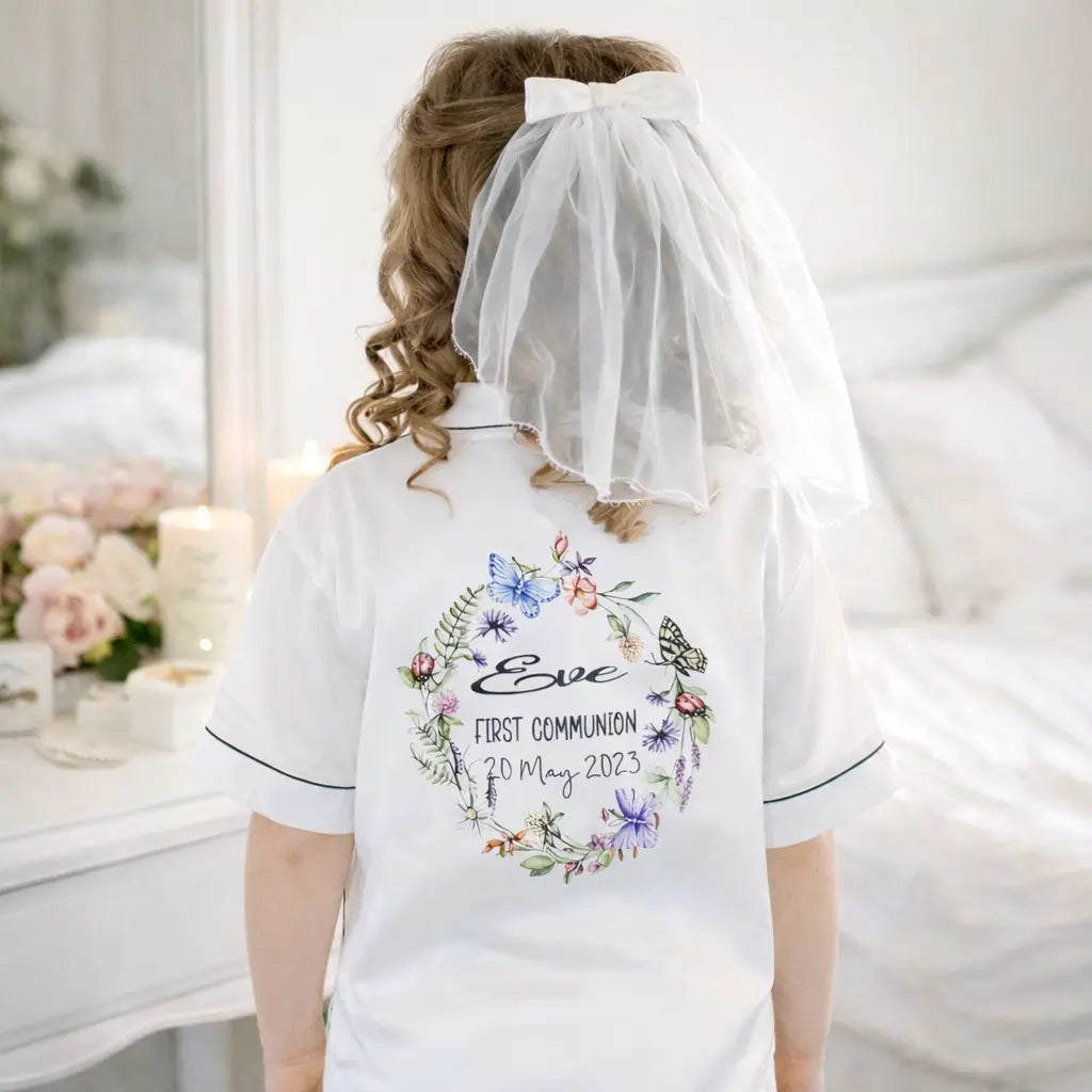 Back view of girl wearing personalised First Communion pyjamas with name and date, Communion morning keepsake outfit Ireland