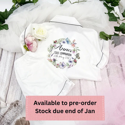 Personalised white First Communion pyjamas with floral wreath design, child’s name and Communion date