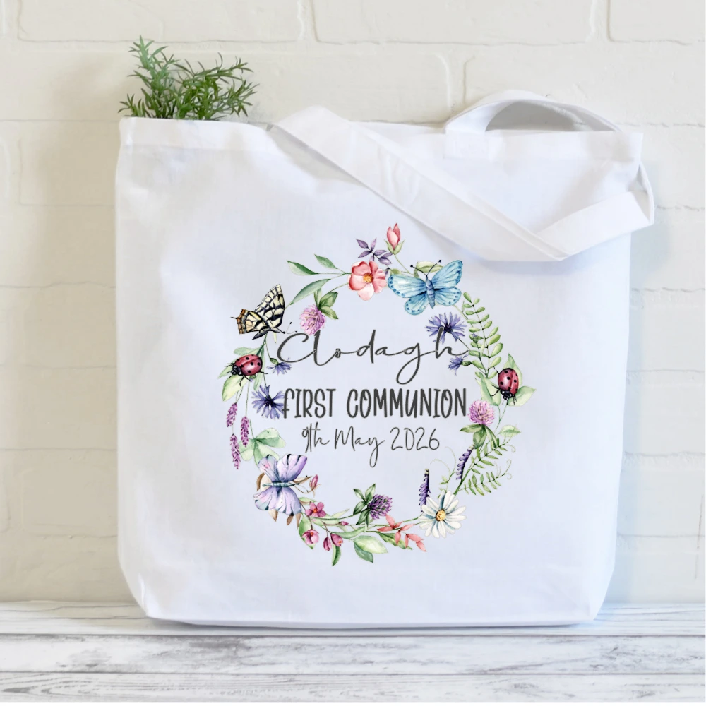 Personalised First Communion tote bag with floral wreath and butterfly design, printed in Ireland with child’s name and Communion date, reusable keepsake bag