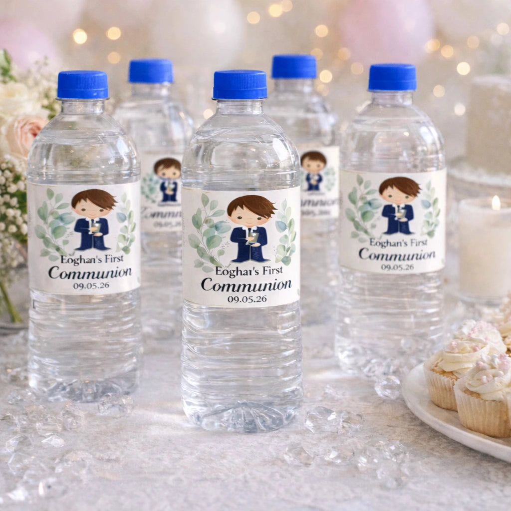 Personalised First Communion water bottles with blue lids, featuring a boy communion design and custom name label, displayed on a decorated communion party table.